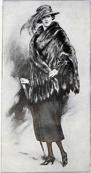 Neat Vintage Image.  Neat Black and White Image of a Lady in Fancy clothing, with hat, furs, etc.  