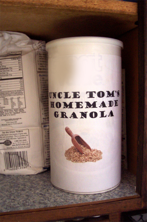 An empty oatmeal box with a homemade label makes a great storage container.