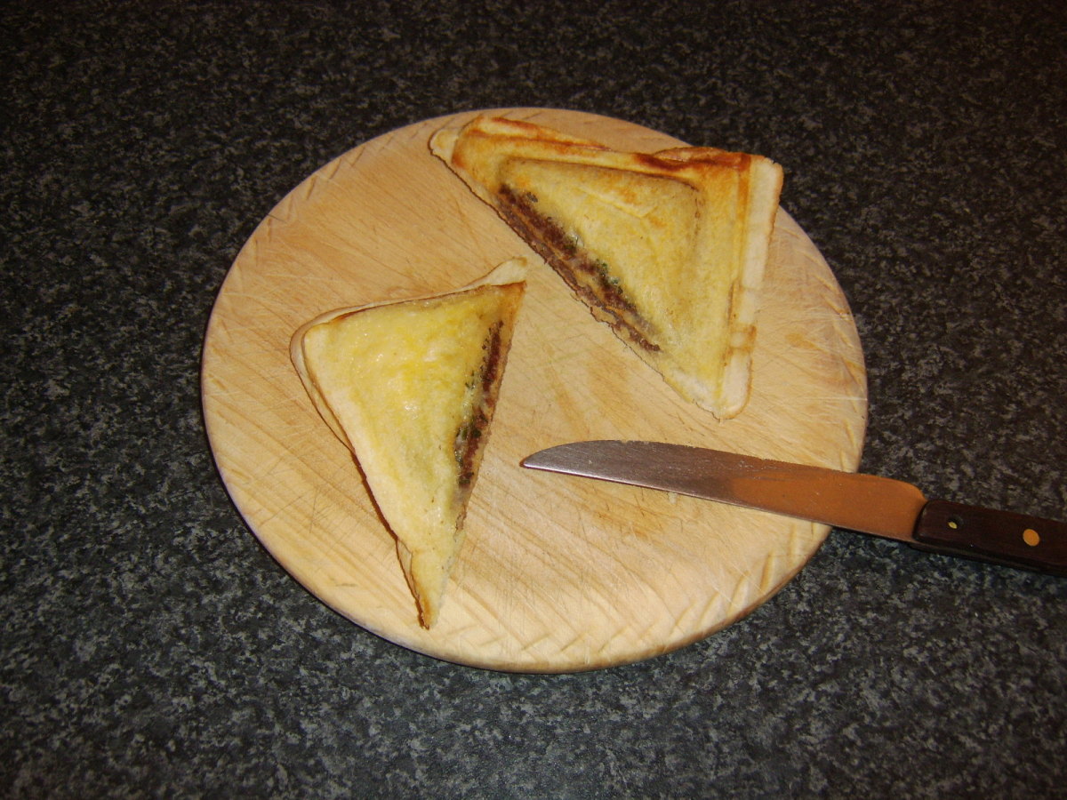 Toasted sandwich is sliced to serve
