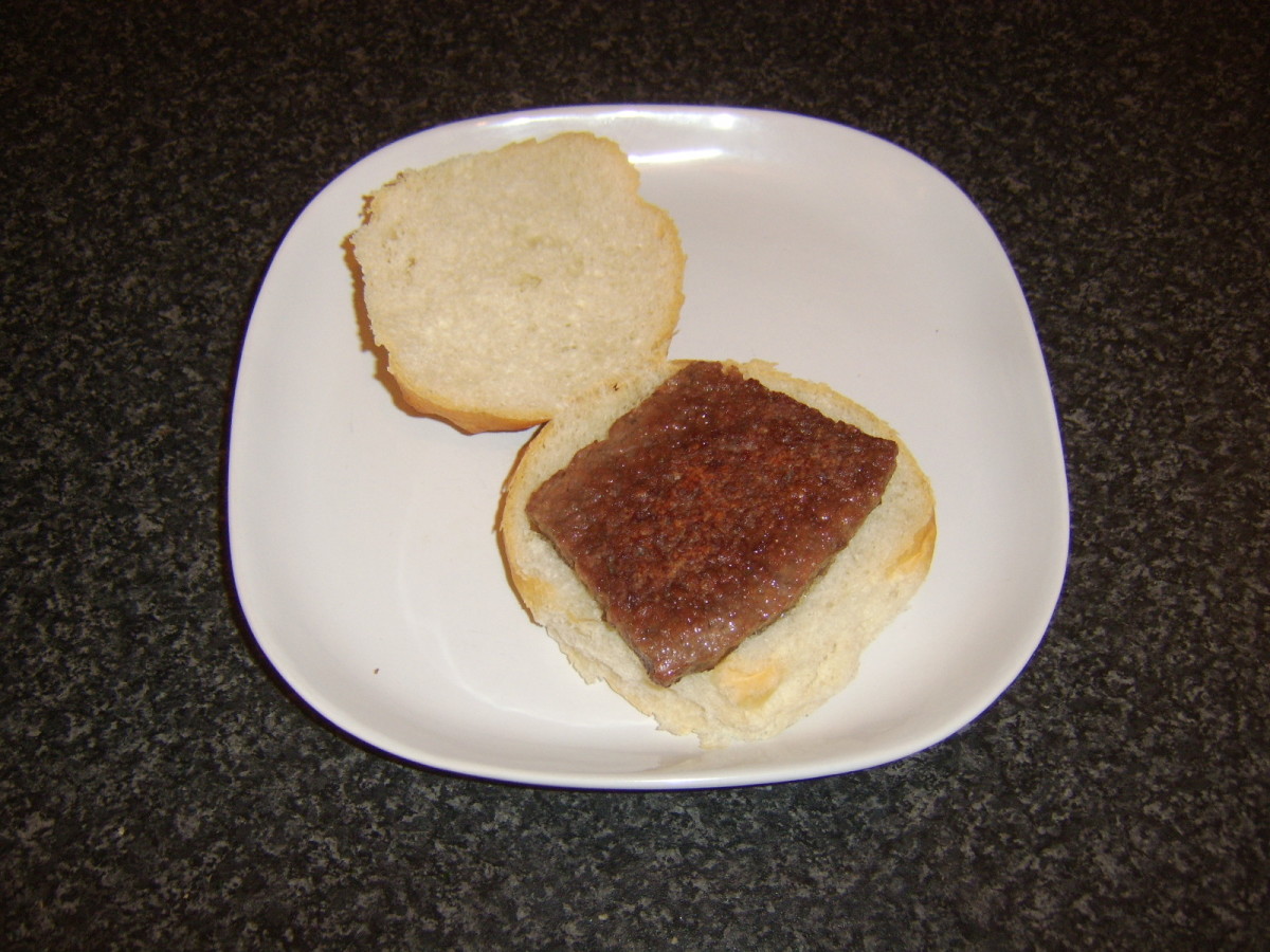 Sausage is laid first on bread roll