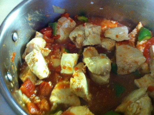 Add the cooked chicken to the pot