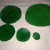 green circular papers each of 1cm diameter difference