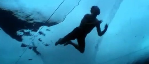 Swimming under ice like this normally requires a "dry suit". Even with two wet-suits on hypothermia would be, can I still say, inevitable?