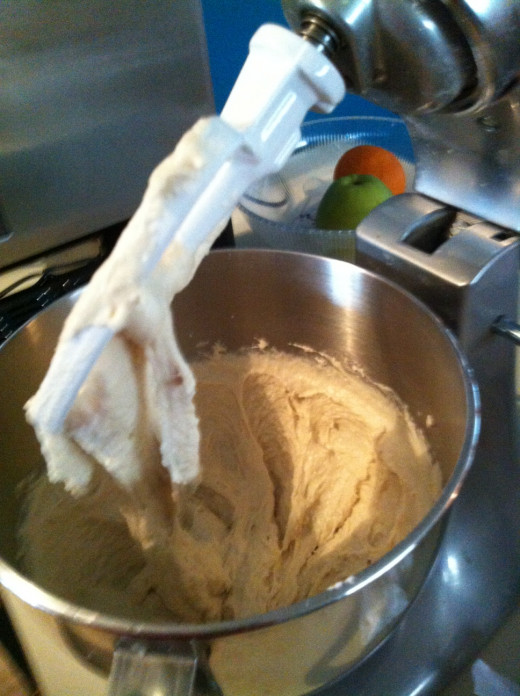 Notice how slack (wet) the dough is. It clings to the bowl and the beater. This makes the focaccia tender!