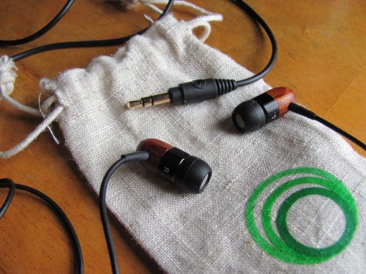 Detail of ThinkSound TS02 earbuds with included cloth case
