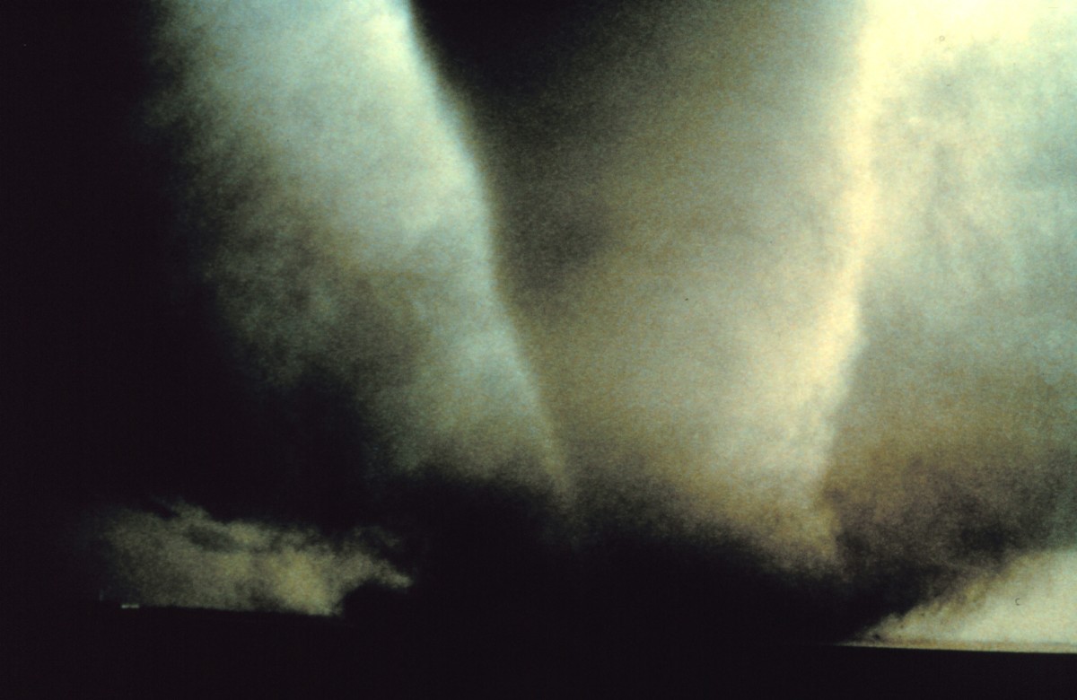 A double twister is photographed south of Dimmitt, Texas, June 2, 1995