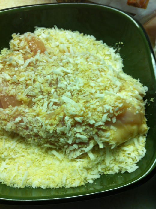 Next coat the chicken breast in the coconut and almond flour mixture