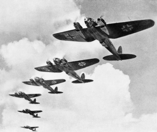 These early Heinkel planes flying in formation are showing the Luftwaffe cross.