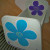 14. Highlight the basic flower with coordinating colors and add a rocker design across the bottom. 14. Highlight the basic flower with coordinating colors and add a rocker design across the bottom.