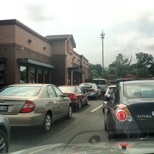 Two cars wide, 20 cars long. That is 40 cars in 15 minutes, and yet, people wait. 