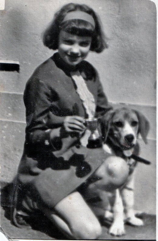 A treasured photo of myself and my precious Lassie taken by a kindly neighbour after I won  a silver cup in school for a story entitiled 'Kindness To Animals.'