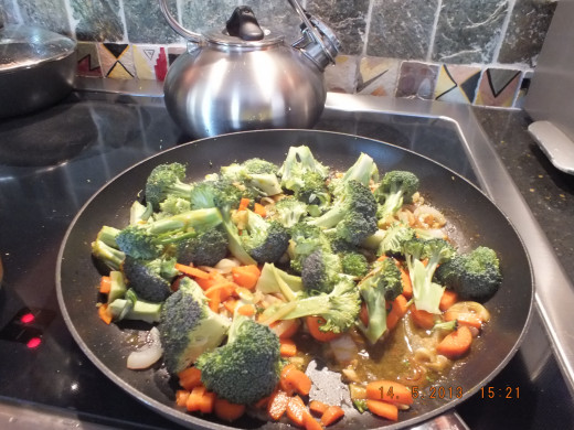 Add the broccoli and carrots.
