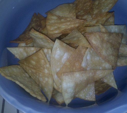 Fresh corn tortilla chips; no salt. Fried in peanut oil.