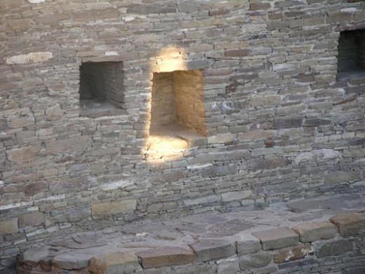 Casa Rinconada  in New Mexico at sunrise on the summer solstice  as the sun's light touches the niche in the wall.