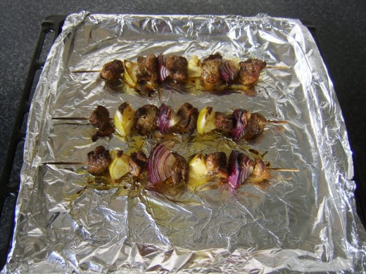 Spicy pork shish kebabs ready to serve