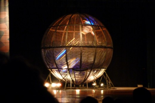 9 c) Sphere showing three motorcycles in it, however a total of eight were in it at one time at the Chinese Acrobatic show