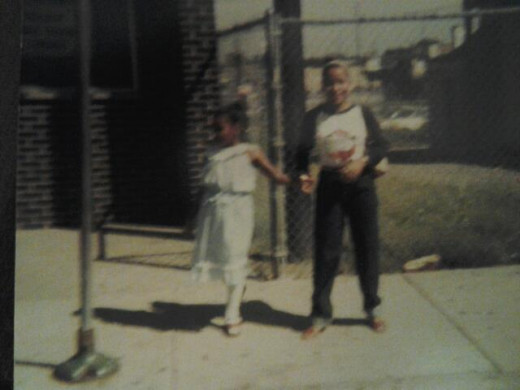 My little sister Keshia about 9 and me about 20!