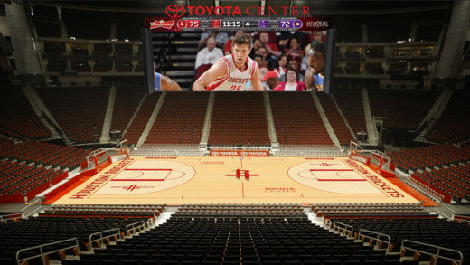 Yes, the Toyota Center video board does stretch almost the length of the court