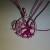 Rearrange limbs and twist a couple together from different groups. Thread beads and bend over frame to keep from sliding off wire.