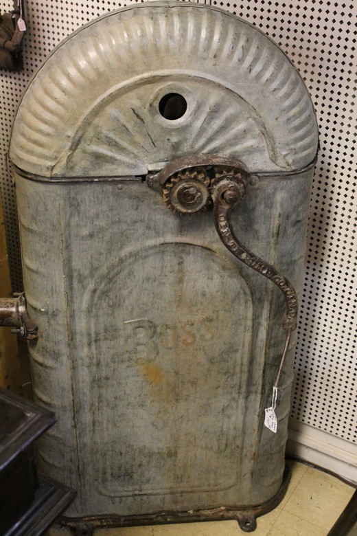 This is an old cistern pump that used a system of buckets attached to chains to lift water out of the cistern.