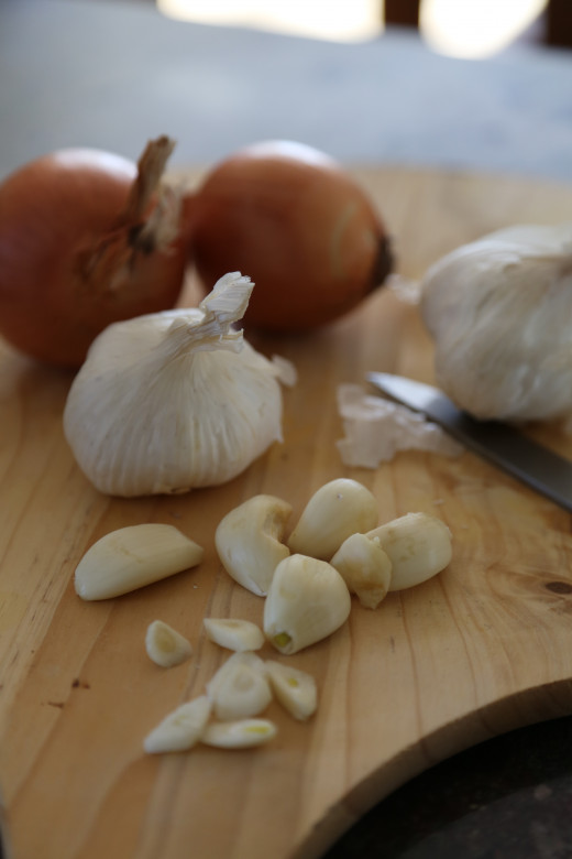Onions and garlic are even better. Caramelize some garlic and onions before putting them on your pizza.