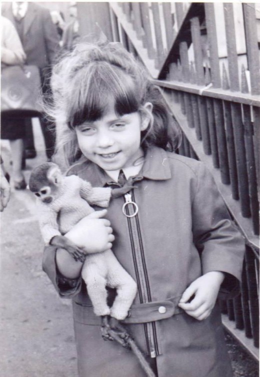 Lucia McKnight again...in rather nonchalant monkey-holding mode