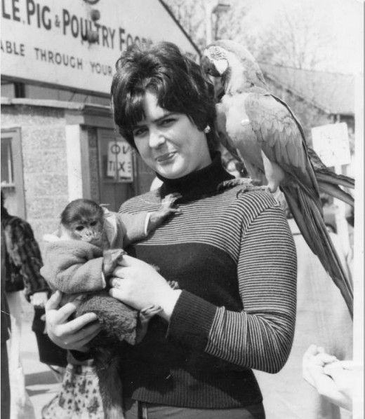 kathy and the monkey...and a parrot...I wonder if she paid extra