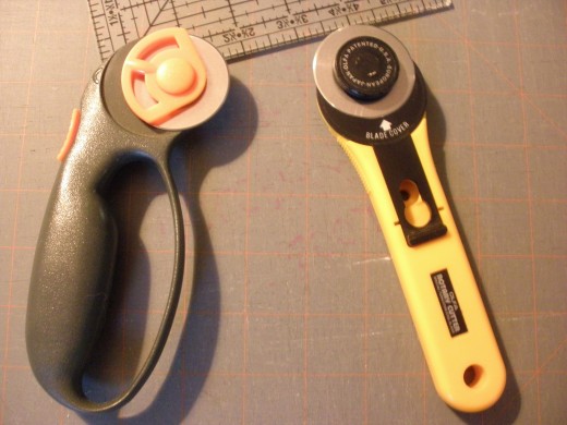 Rotary cutters with their blades open should not be left on the cutting table.  Be sure to retract the blades every time before you put the rotary cutter down.