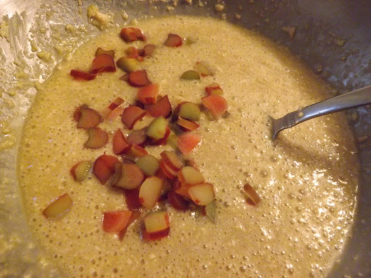 Add the Rhubarb - the batter will be fizzy due to the soda.