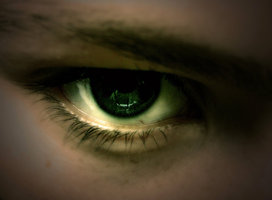 A tall, dark stranger entered the bar/restaurant. He was 6'6" tall with jet black hair & piercing black eyes.He was handsome in a Mephistophelean way.He was coldly self-confident, studying & sizing up people as a cobra does its prey.
