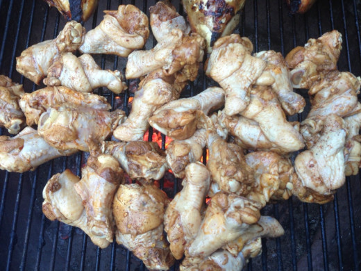 Raw wings on grill