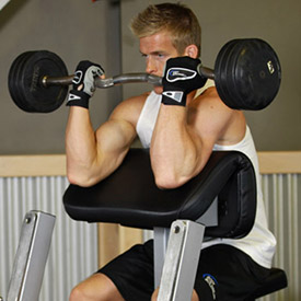 Preacher curls allow the weight to be more easily controlled, creating a much better focus on the biceps and furthering their development.