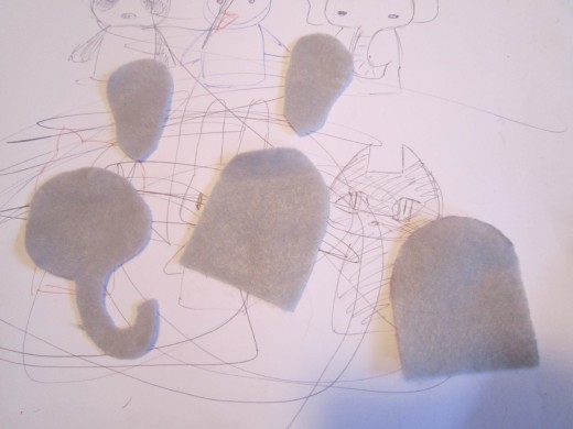 Cut out the shapes for your felt finger puppets.  Carefully cut along the lines so that you trim off the pen/pencil marks.