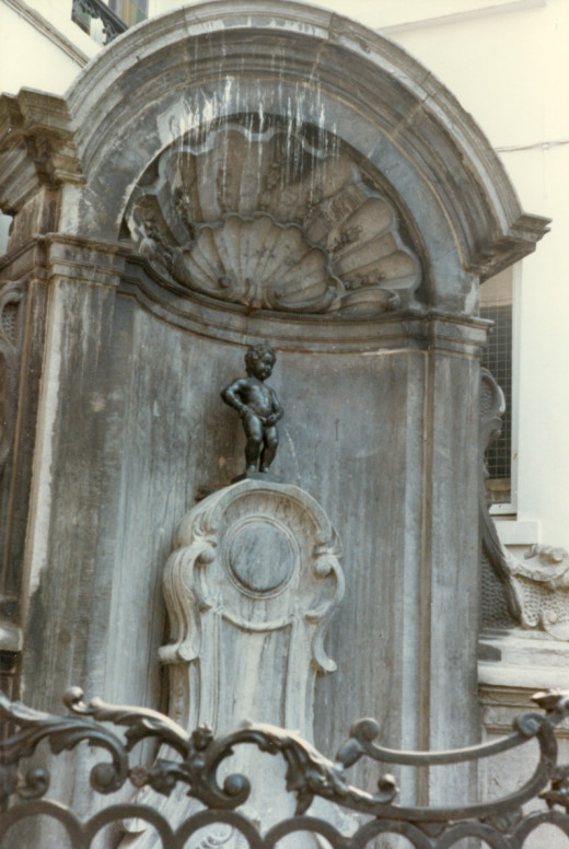 Mannekin Pis Statue.  During World War II, they would place this picture over a photo of Adolph Hitler as a protest.