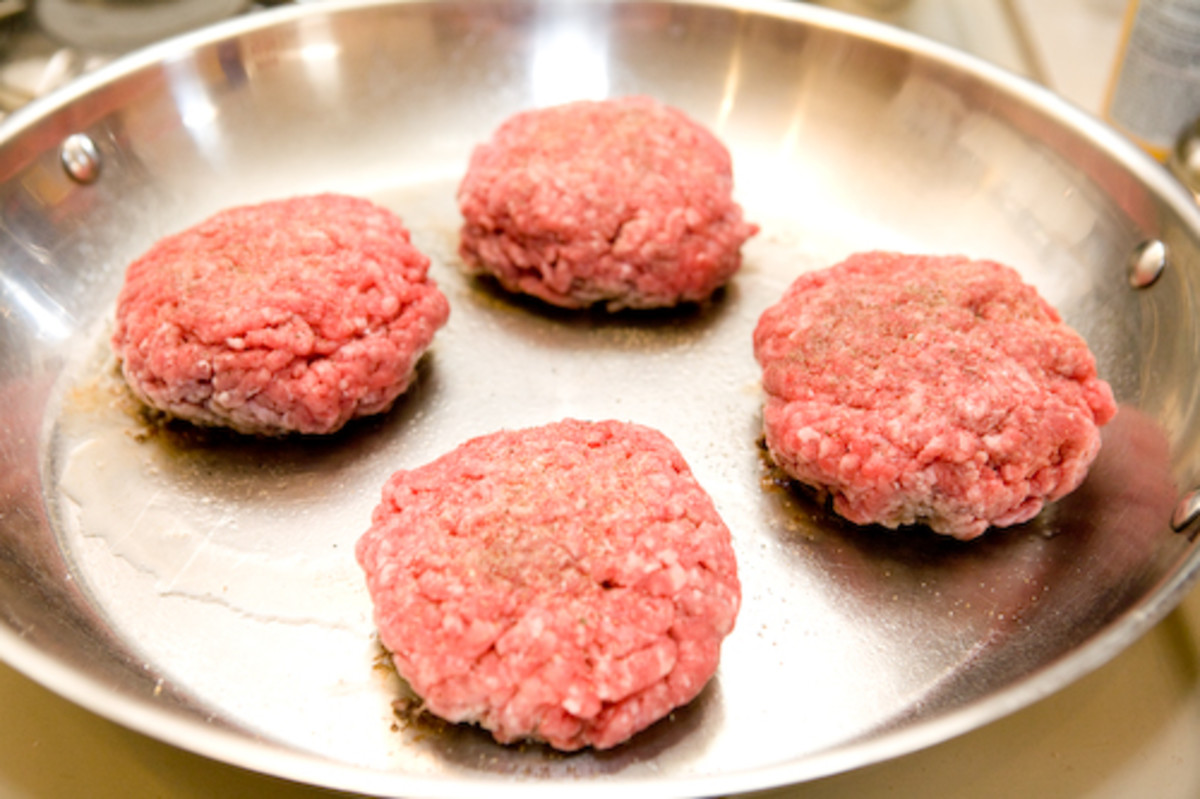 Divide the ground beef into four equal portions, shape into patties, and season with Worcestershire sauce, garlic powder, salt, and pepper. Cook on a stove top or on a grill - approximately 3-4 minutes each side for medium rare and longer, if desired