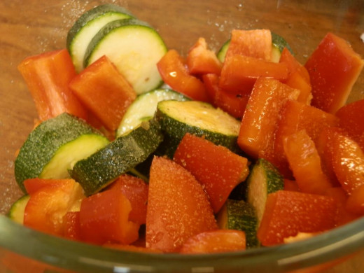 red pepper and courgette, chopped and salted
