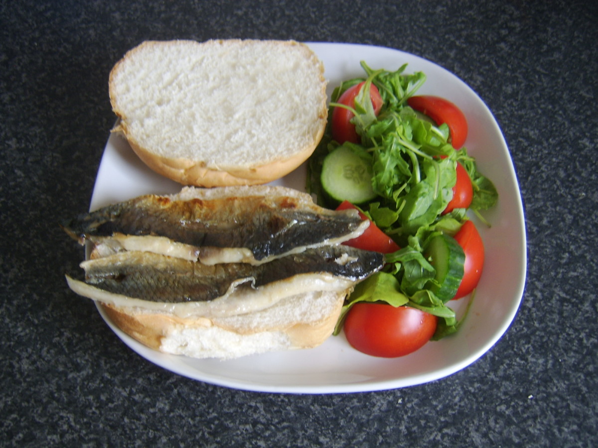 Herring fillets are laid on bread roll