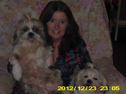 Me with my girls, Abby and Sunny. As you can tell these girls love for their pictures to be taken and love to be held.