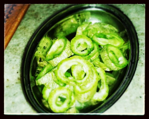 Step 1 : Slice Snake gourd in round,  clean it by removing the seeds.