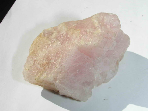 A piece of unpolished rose quartz crystal. Whether polished or unpolished (raw) crystals cand be very effective healers. 