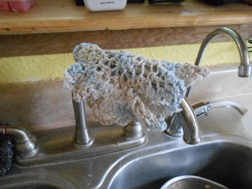 Hang wet dish towels on the neck of your kitchen faucet to allow them to dry between uses.