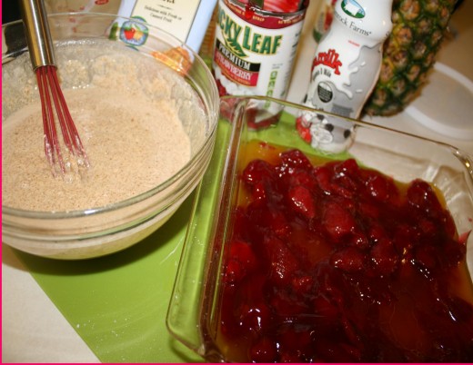 Mix the Louisiana Cobbler Mix with the milk and pour on the strawberries.