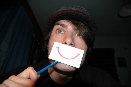 Smiling through difficult situations helps improve your mood and others around you.