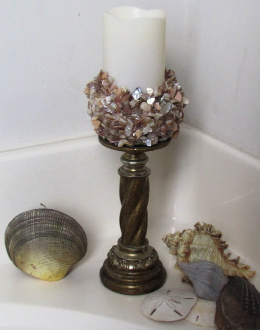 Make your own barnacle LED candle for about $15.  It's simple and will bring back memories of the beach for years.