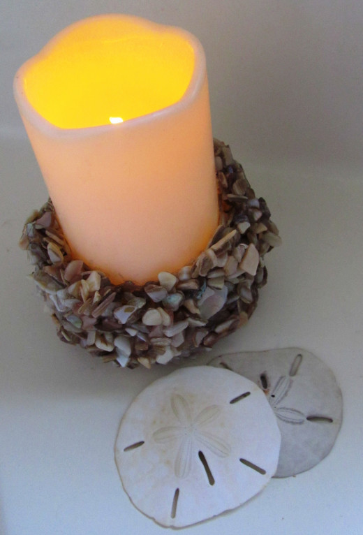 This LED candle gives the appearance of a flame without the burning hazard of a wick candle.