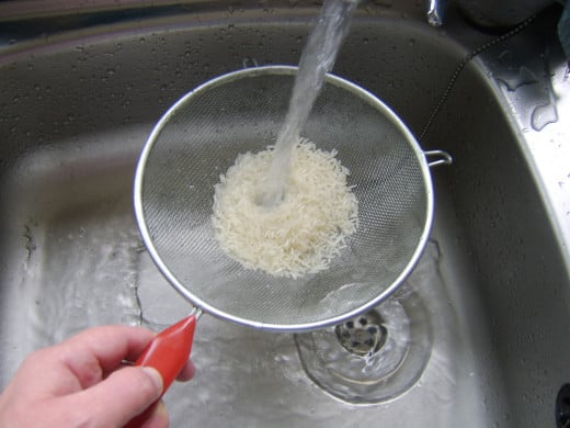 Rice is washed thoroughly before being cooked
