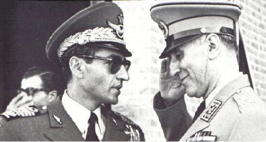 1953 - big shots such as the Shah Reza of Iran turn up wearing sunglasses whilst conducting important business. Subordinates scoff. Envious of how cool he looks in shades, secret operatives overthrow him for that very reason. Or not.