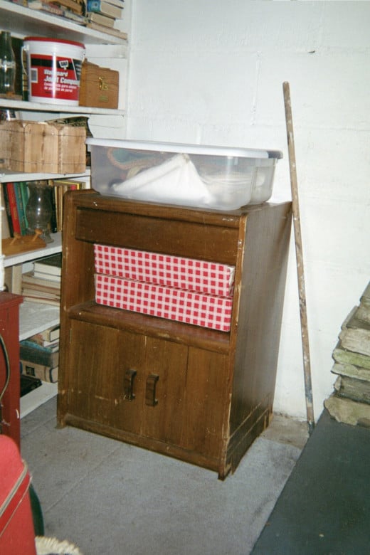 Cabinet found down alley sitting at the bottom of the basement stairs.