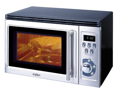 A microwave oven is a kitchen appliance that cooks or heats food by dielectric heating.