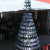 A Christmas tree made out of emtpy beer and rum bottles. Definitely not something I've ever seen before.